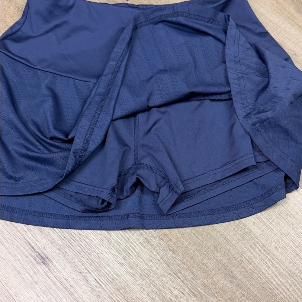 Women's Blue Tennis Skirt w/ Built in Shorts‎ (bought in Spain). Size Small